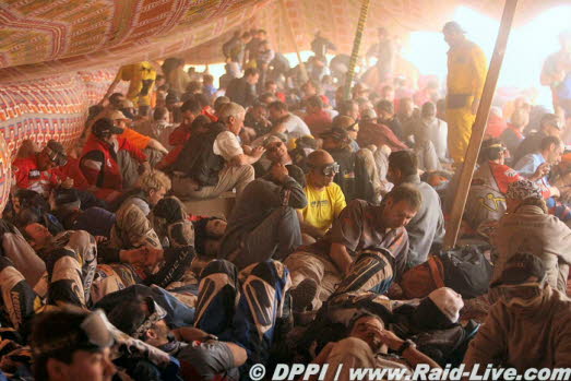 The racers resting under the blankets of shade