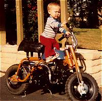 Getting ready to go riding on the Z50. See the foot pegs my dad put on it right under the tank for me?